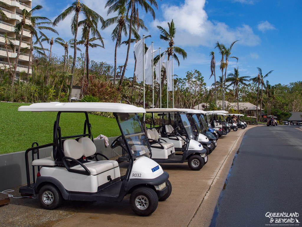 Golf buggies lined up outside the Reef Hotel, Hamilton Island