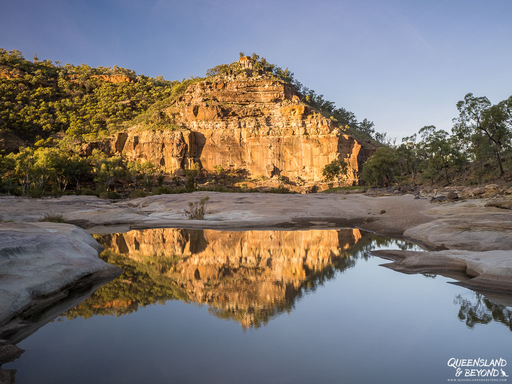 Early morning reflection of Pyramid Rock, Porcupine Gorge National Park, Queensland, Australia